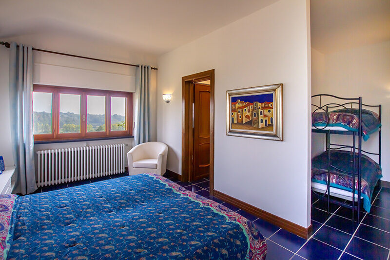 Schlafzimmer Marco Polo mit 4 Schlafmöglichkeiten im Ferienhaus Tenuta CostaRossa